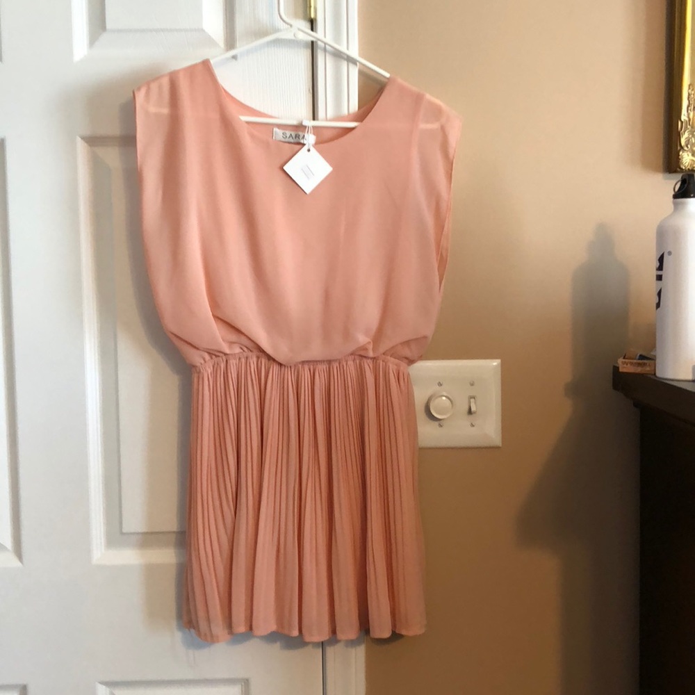 Woman’s blouse or mini one piece dress
